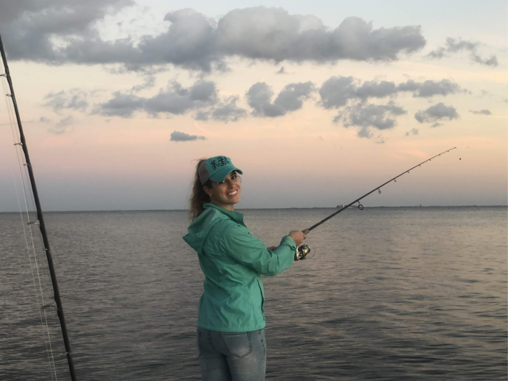 Girl fishing in January - perfect outdoor activities in St. Petersburg