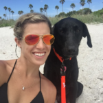 Girl and dog at the beach